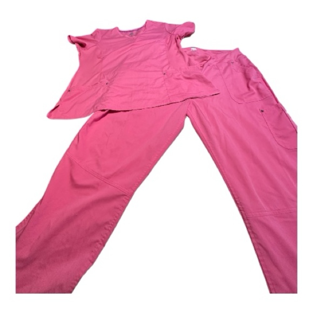 Healing Hands Scrubs coral color.
Worn once Hospital changed colors.